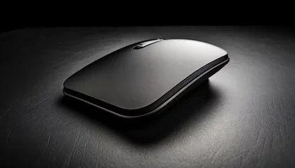 Foto op Canvas a black mouse pad placed on a black surface suitable for technology or office themed designs © Enzo
