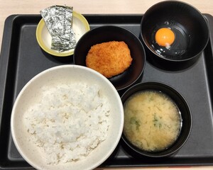 Potato croquette, raw egg sprinkled on rice, Japanese food