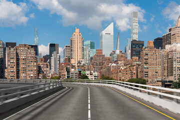 Empty urban asphalt road exterior with city buildings background. New modern highway concrete...
