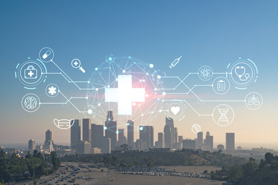 Skyline panorama of Los Angeles downtown at sunset, California, USA. Skyscrapers of LA city. Hologram healthcare digital medicine icons. The concept of treatment from disease, Threat of pandemic