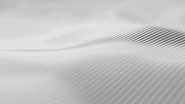 Bright gray wavy background. Looped white neutral Wallpaper with waves for technology, mechanical engineering, trade in materials. Footage in Ultra HD 4K. 