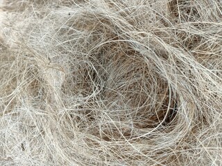 Coir, also called coconut fibre, is a natural fibre extracted from the outer husk of coconut, and used in products such as floor mats, doormats, brushes, and mattresses