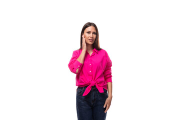 confident young brunette secretary woman wearing a pink shirt