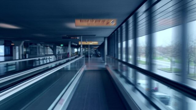 Moving walkway at airport building corridor Time lapse