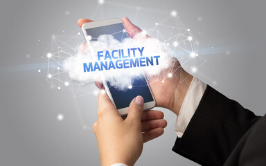 Hand using smartphone with cloud business concept