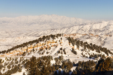 Tian Shan mountains scenic view from the slopes of Amirsoy ski resort (Tashkent region, Uzbekistan)