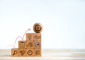 Business goal with growth success process for leadership concept. Target icon on wood ball on top...