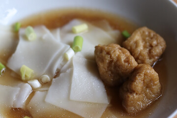 Tofu Noodle Vegan Vegetarian food. Street food rice noodle Chinese five spice soup. Healthy food concept