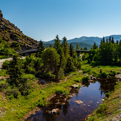 Beautiful picturesque landscape with mountains, river and forest.Beautiful view of the mountains.Natural place to relax.