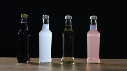Multi color Beverage  drinks bottles, Many bottles of juice  drinks on table, flat lay