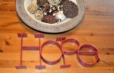 Hope Decoration by a Decorative Bowl on a Wooden Table