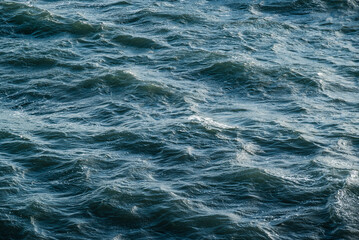 Beautiful full frame shot of the rippled ocean surface near Dyrhólaey, Iceland, forming a useful water background texture