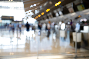 Airport terminal Departure Check-in counter.Abstract Blurred image background. - obrazy, fototapety, plakaty