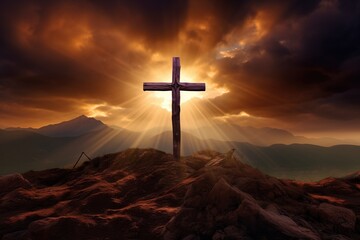 Cross on the rock with dramatic sunset sky background. Christian concept.