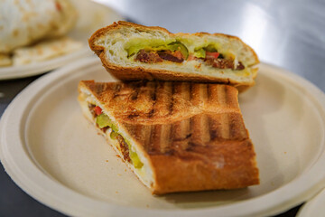 Traditional Armenian sandwich made with lavash flat bread and sujuk or or soujoukh, Middle Eastern sausage at a food festival in San Francisco