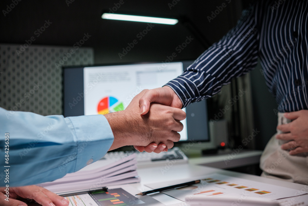 Poster success in negotiating and entering into business contracts, meeting commitments in a meeting room a
