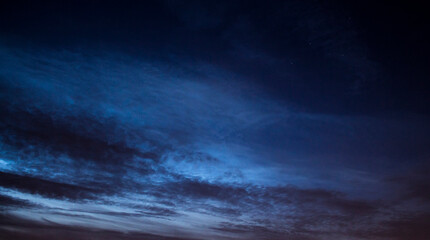 Fototapeta na wymiar Noctilucent clouds at twilight