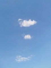 blue sky with two clouds