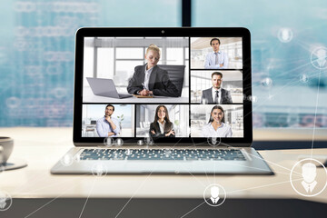 Professional online meeting via video conference call on laptop. Virtual teamwork and strategy session