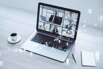 Online conference call with multiple participants on computer screen. Remote business communication