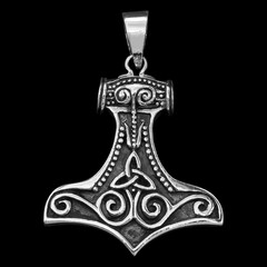 Silver Mjolnir pendant. Peruns ax. Pagan Style. Ancient amulet of Vikings and Slavs. A symbol of strength and power. Protection from evil spirits.