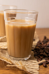 Cup of coffee with milk in American glass, Typical Breakfast in brazil.