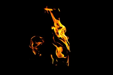 Foto op Plexiglas Fire flame texture. Burning material backdrop. Burn effect pattern. Blaze and torch wallpaper. Heat and haze backdrop. © Jozsef