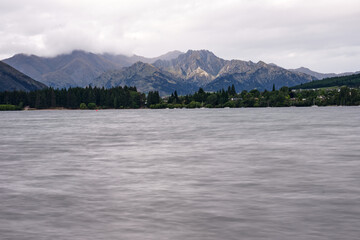 lake and mountains in wanaka, new zealand