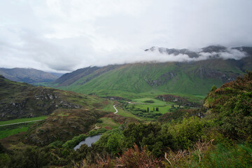 landscape with mountains and clouds in new zealand