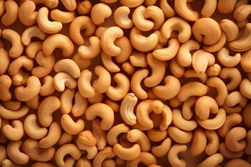 Background with cashew nuts texture, close-up view from above.
