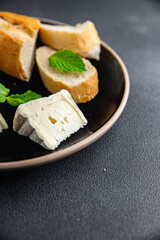 cheese soft white mold creamy taste fresh eating appetizer meal food snack on the table copy space food background rustic top view