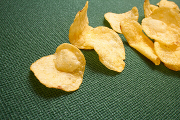 potato chips on the green background
