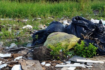 A pile of plastic garbage on the ground, environmental pollution concepts.