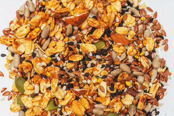 mixed seeds on a light background. mix of cereals for a healthy diet on a white background. assorted cereals for granola