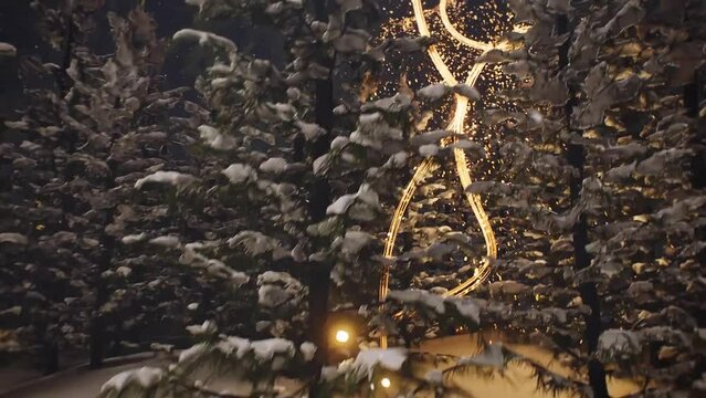 3D Animated Scene Of Fireworks Illuminates Forest Rushing Through To Lake Spiralling To Form Christmas Tree Shape.