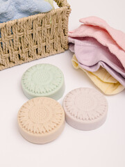 Three pieces of natural household soap on white background. Washing socks