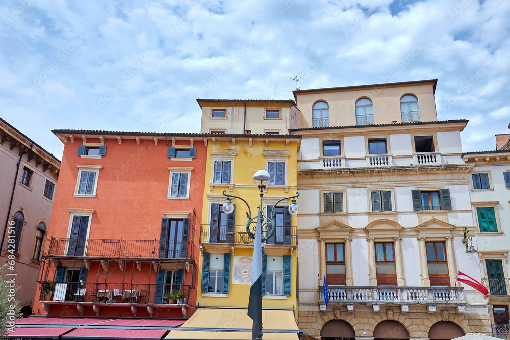 Poster Beautiful patrician houses around the Piazza Bra at the amphitheater in Verona, in the province of Veneto, Italy.
