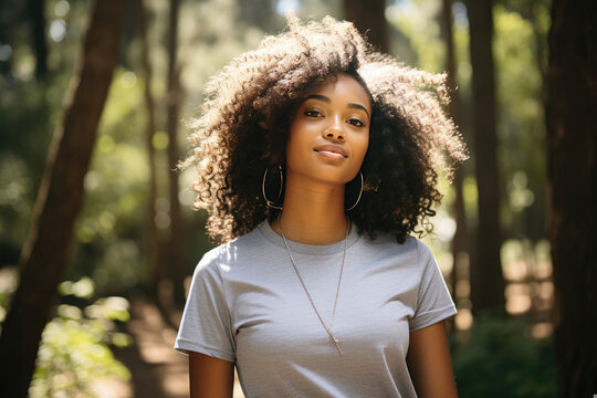 Young African American woman enjoying serene summer day in nature positivity and relaxed confidence portrayed