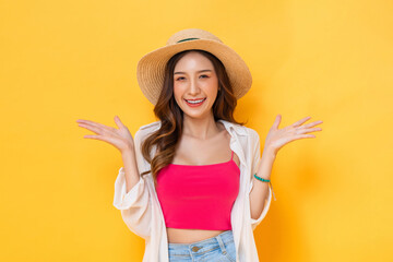 Waist up portrait of smiling pretty Asian woman in summer outfit with open hand gesture in colorful...