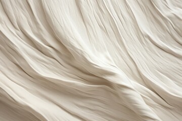 Obraz premium Accumulated woven linen fabric structure, tenderly draped texture of beige linen fabric, pleated visual background, template, copy space.