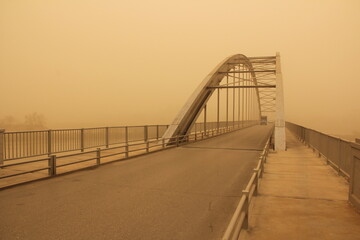 Dust and Elegance: White Bridge of Ahvaz Amidst the Haze