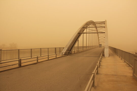 Dust and Elegance: White Bridge of Ahvaz Amidst the Haze
