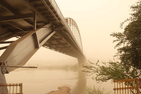 Dust and Elegance: White Bridge of Ahvaz Amidst the Haze