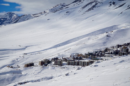 Village in the mountain in a snowy day. View of El Centro La Parva in the Farellones Valley, Chile, on a beautiful winter day.