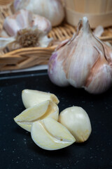 Cooking with dried French garlic. Red garlic. Violet garlic.