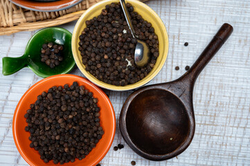 Indian spices collection, dried black peppercorns, kitchen spices