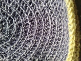 Beach bag made of blue and beige jute, crocheted