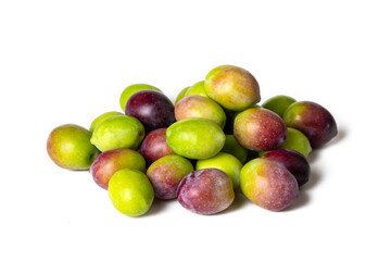 Fresh green olives on the white background