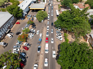 aerial view of car traffic on busy street, a residential area in the city center of Gaborone,...