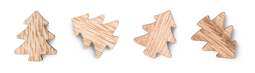 small cut-out wooden fir trees isolated over a transparent background, natural wood Christmas /...